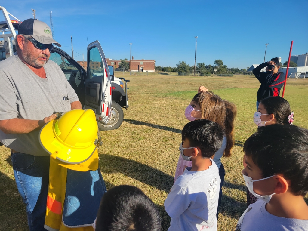 K-1 South students learning about fire fighter gear and fire safety.