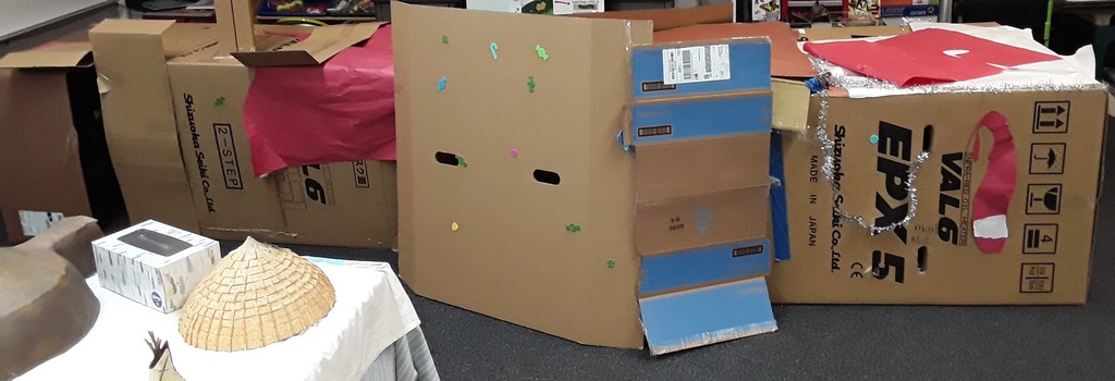 Pueblo made by students from cardboard as a playhouse